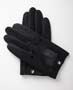 Genuine black leather gloves are unlined and perforated at the knuckles for flexibility. Import.